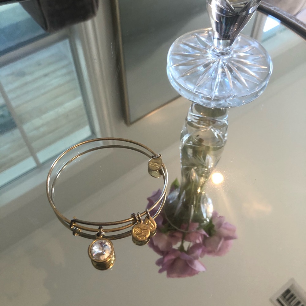 Alex and ani bracelet in brass. April crystal
